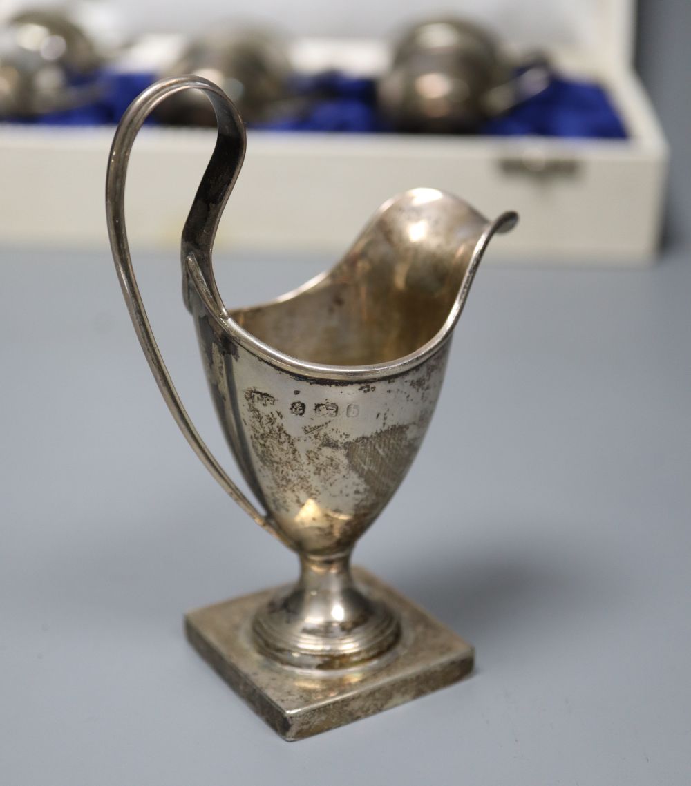 Mixed silver including cased silver cased berry spoons, cups, cream helmet, etc.